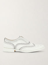 Black outline white brogue shoes, side view - Luke Grant-Muller