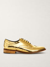 Mirror finish gold metallic brogue shoes, side view - Luke Grant-Muller