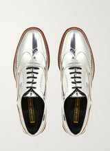 Mirror finish silver metallic brogue shoes, top view - Luke Grant-Muller