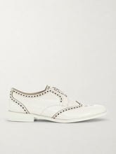 Patent white wingtip derby shoes with black brogueing, side view - Luke Grant-Muller