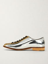 Two-tone silver and gold bowling shoes, angled detail view - Luke Grant-Muller